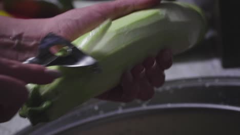 Women's-hands-wash,-peel-and-cut-vegetables-into-vegetable-stew