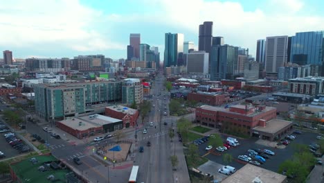 downtown denver rhino art district cityscape businesses buildings aerial drone colorado tall skyscrapers cars streets spring summer afternoon sunset landscape stormy clouds sunny upwards motion