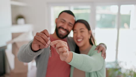 Happy-couple,-real-estate-and-keys-in-new-home