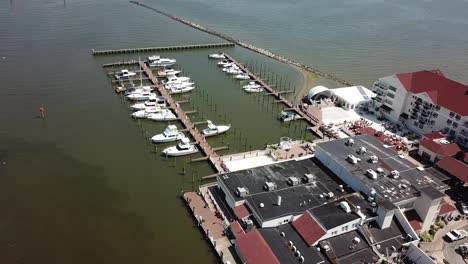 Aerial-View-of-Chesapeake-Bay-Fishing-Creek-and-Harbor-With-Boat-Marina-and-Coastal-Buildings,-Maryland-USA