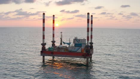 offshore platform at sunset/sunrise