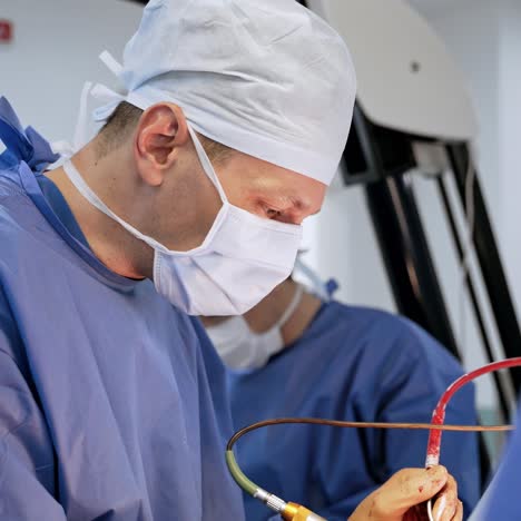 team surgeon at work in operating room. modern equipment in operating room. medical devices for neurosurgery.
