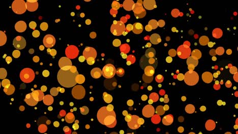 yellow-and-orange-circles-against-against-black-background