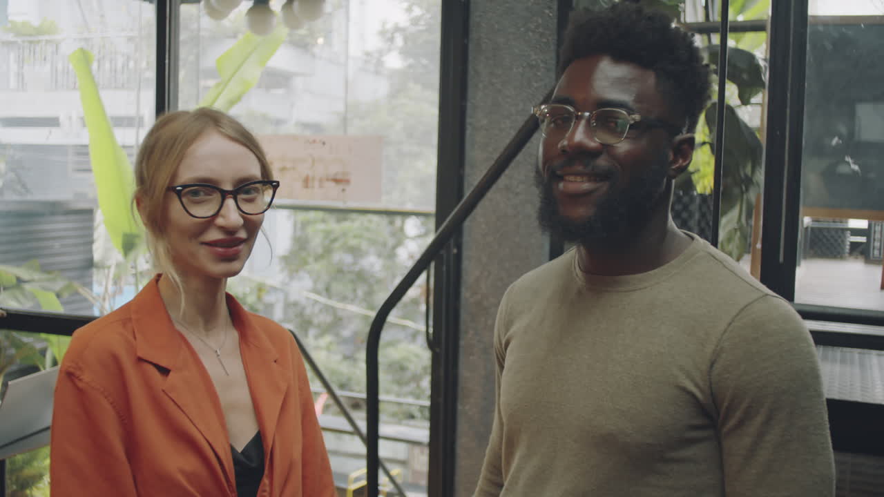 Two business people indoors