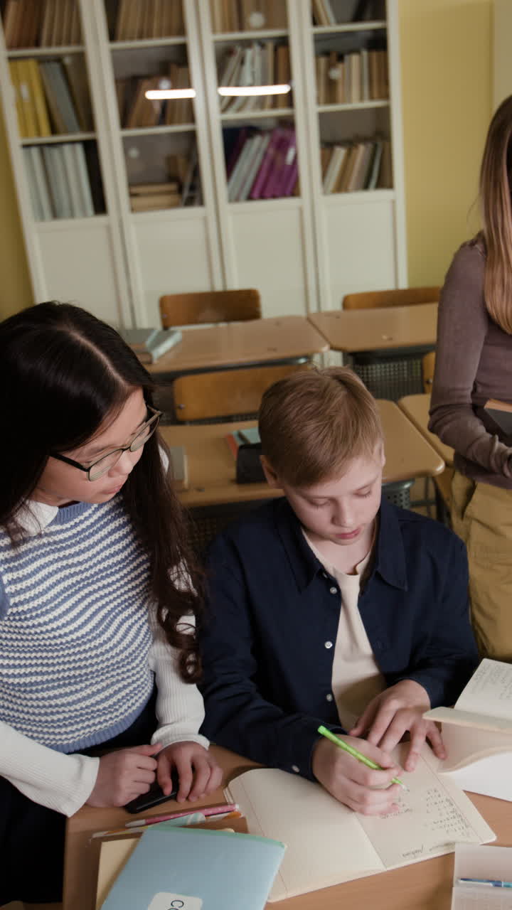 Students studying and collaborating in a classroom