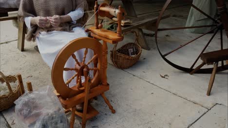 spinning cotton on wheel