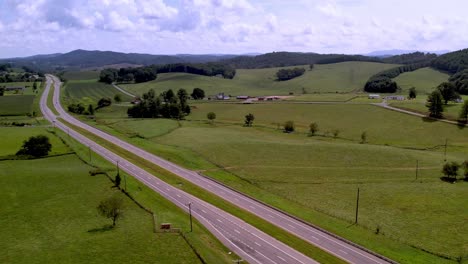 Aerial-of-roadway-in-farm-country-in-southwest-virginia-between-galax-and-independence-virginia