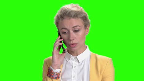 young pretty business woman talking on phone.