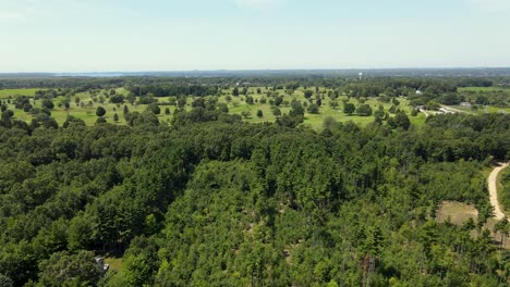 an aerial push to show off a golf course from the air