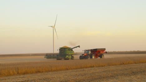 midwest farm being harvested in the brisk october early evening