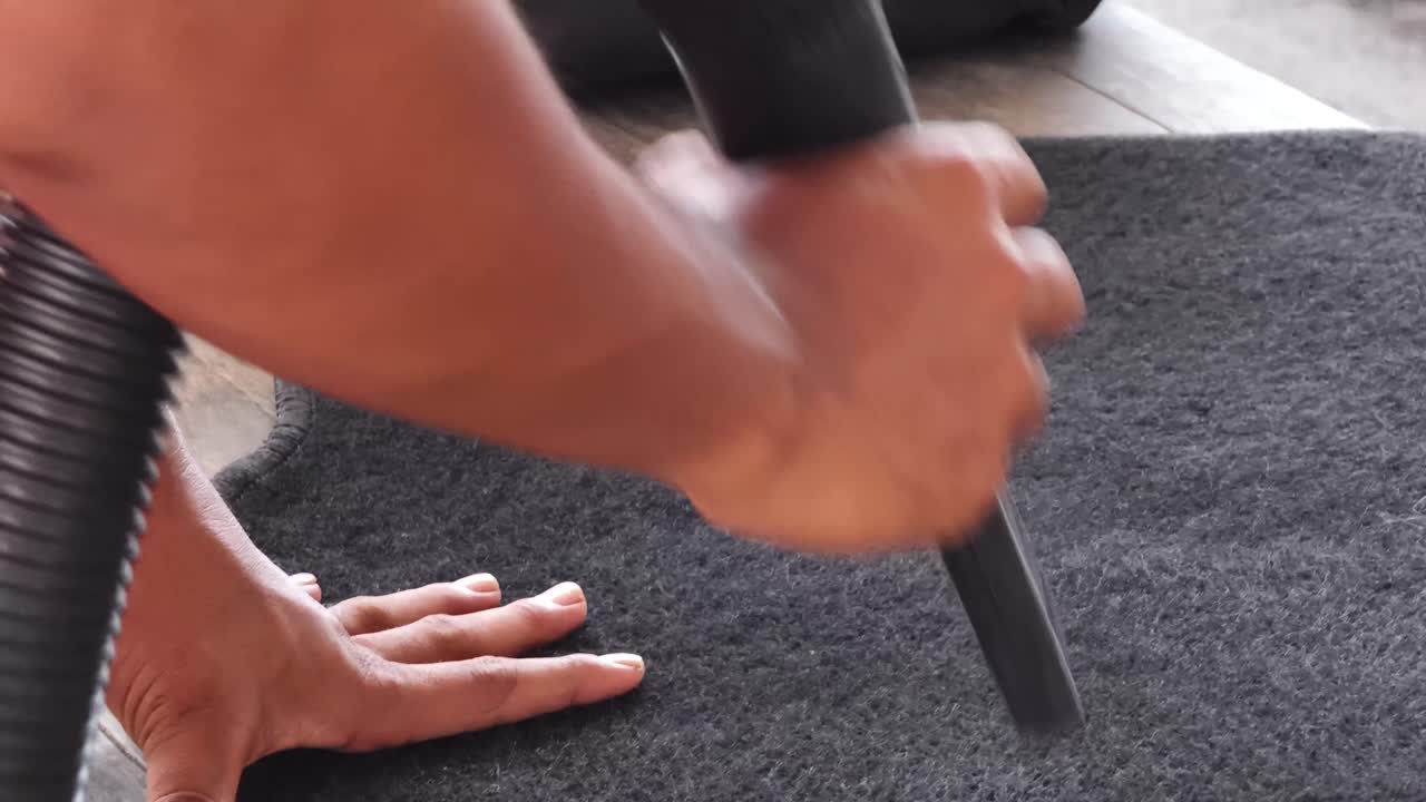 Cleaning a Car Floor Mat with Vacuum