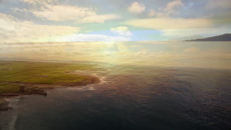 reflecting colorful sky, calm ocean waves near distant coastline creating animation