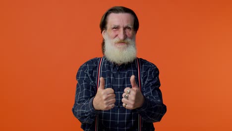 Mature-old-bearded-grandfather-showing-thumbs-up-and-nodding-in-approval,-successful-good-work