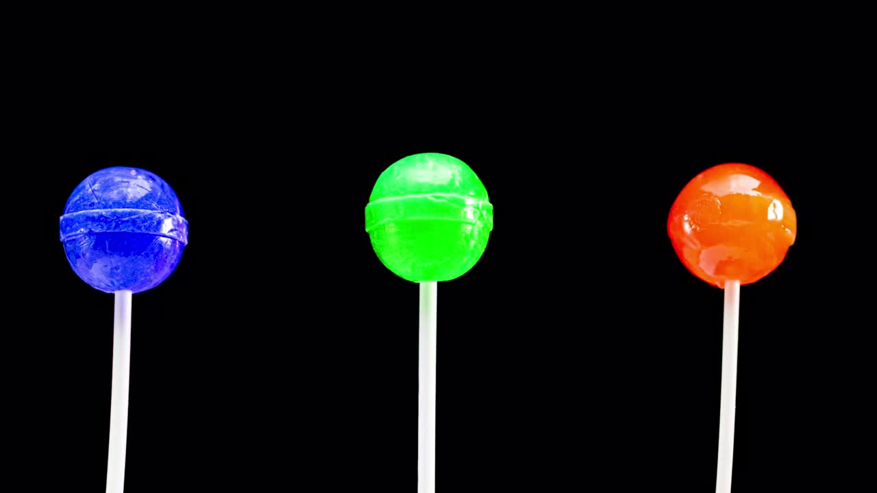 검은색 배경에 스 모션 릴리 애니메이션, 달한 사탕, 카라멜 사탕