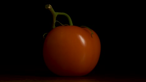 single orange tomato