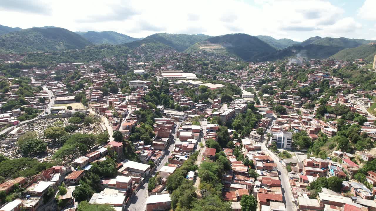 Guarenas in miranda, venezuela, with hills and colorful homes, aerial view
