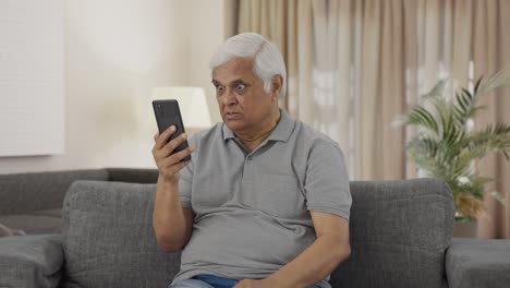 Angry-Indian-old-man-shouting-on-video-call