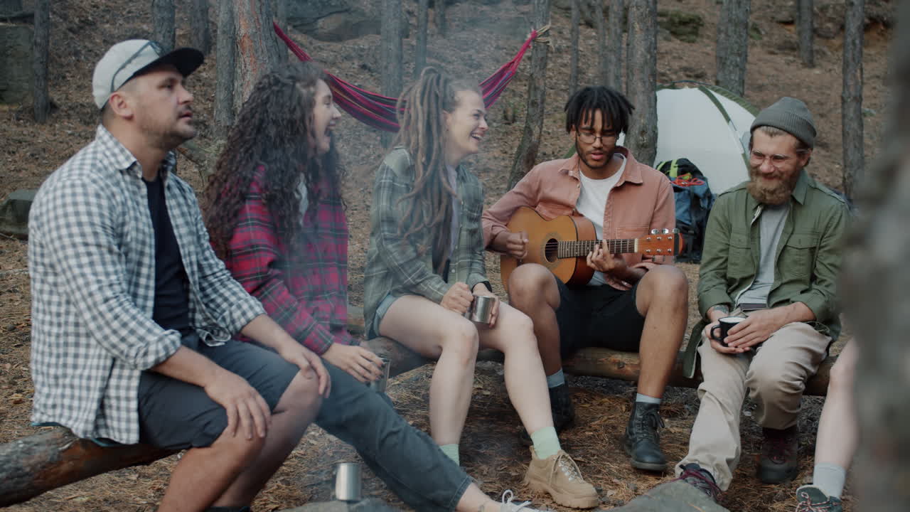 Friends Enjoying a Campfire Song