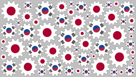 japanese and south korean flag gears spinning background