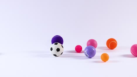 various balls bouncing and interacting dynamically