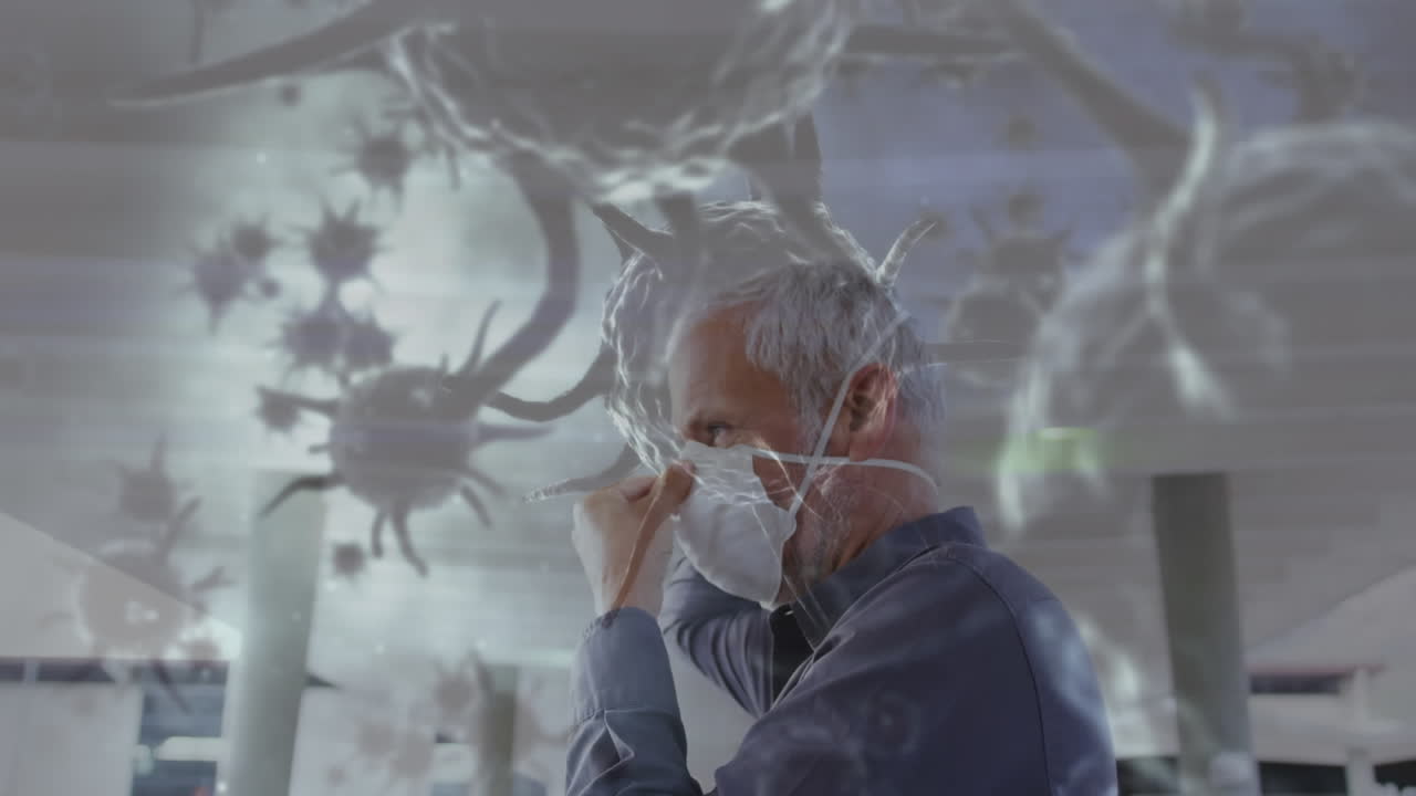 코로나19 세포가 얼굴 마스크를 쓰고 있는 사람을 가로질러 움직이는 애니메이션