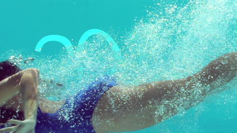 Woman swimming underwater