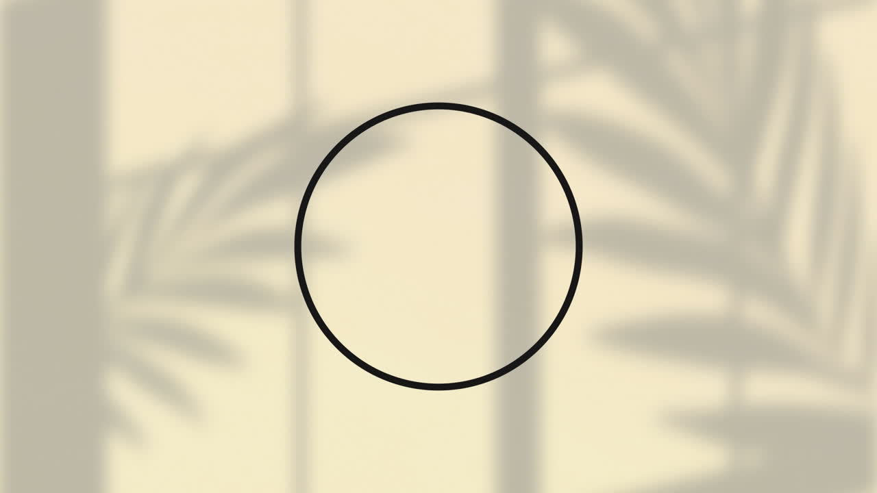베이지 바탕에 잎 그림자 위에 형성되는 검은 반지의 애니메이션