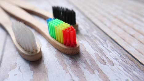 close-up of colorful bamboo toothbrushes