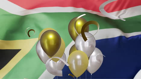animación de confeti y globos sobre una pelota blanca de rugby y la bandera de sudáfrica