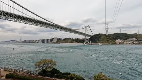 view over kanmon bridge and the kanmon strait in between the japanese islans honshu and kyushu