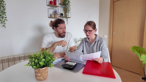 couple reviewing finances at home