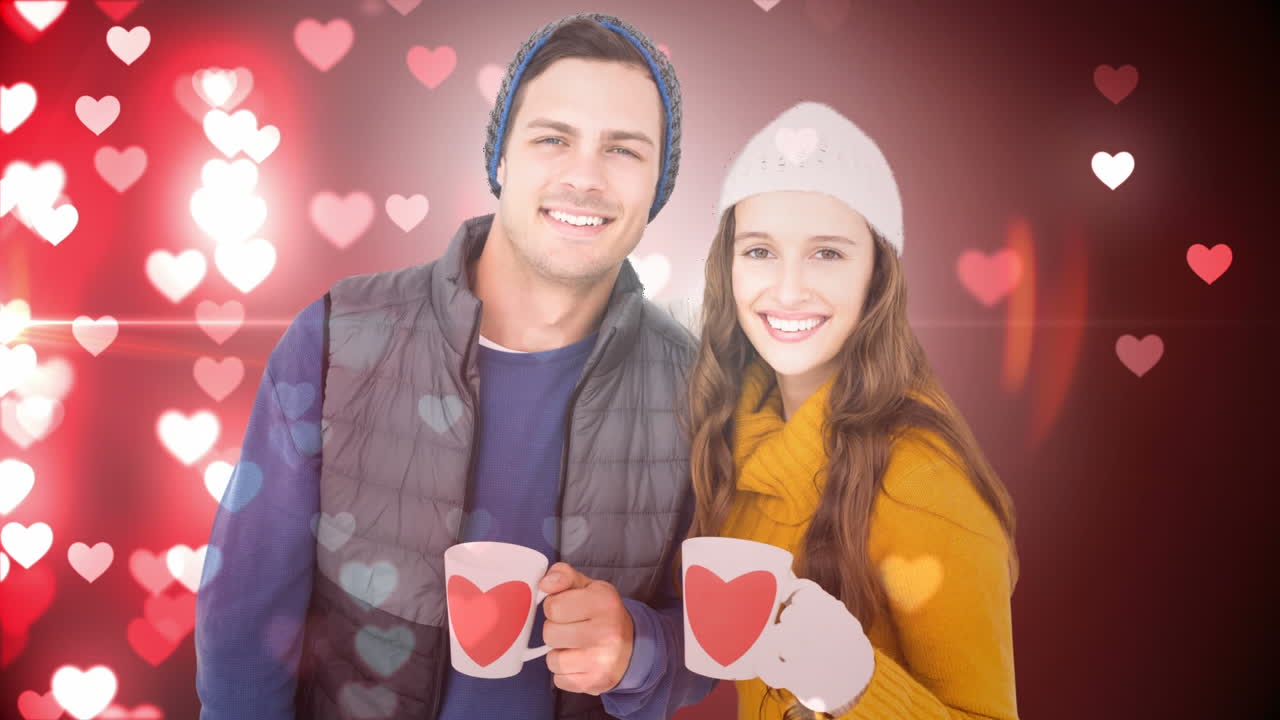 행복 한 커플 이 겨울 의 옷 을 입고 웃고 있다