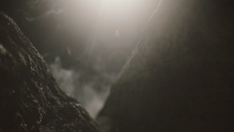 close up view of rocks in the smoke, mountains at night