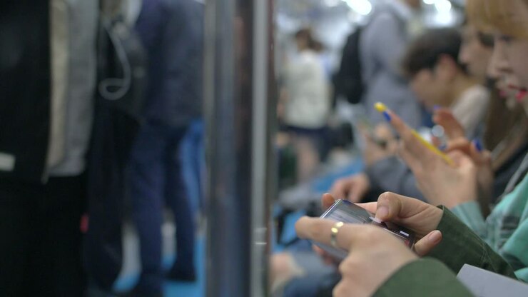 Commuters on Smartphones