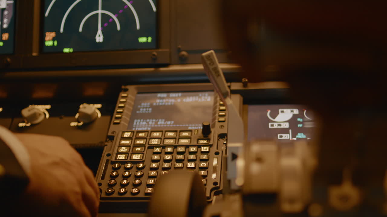 Captain inserting destination coordinates on cabin dashboard