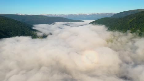 aerial footage beautiful nature norway over the clouds.