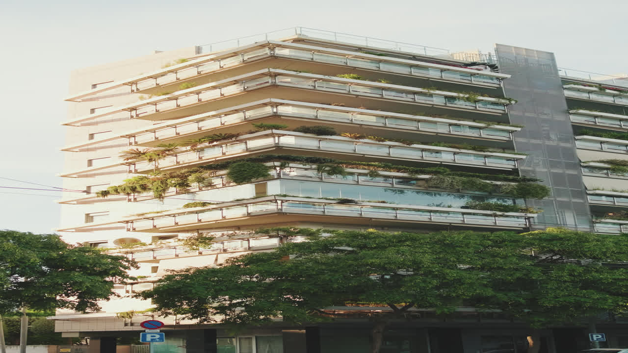 Modern Building with Balconies and Plants