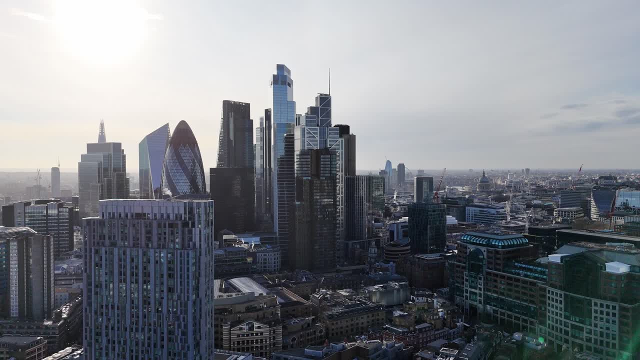 Skyscrapers London financial district skyline Panning drone aerial