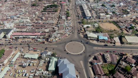 Busy-traffic-intersection-in-Gombe,-Nigeria---aerial-orbit