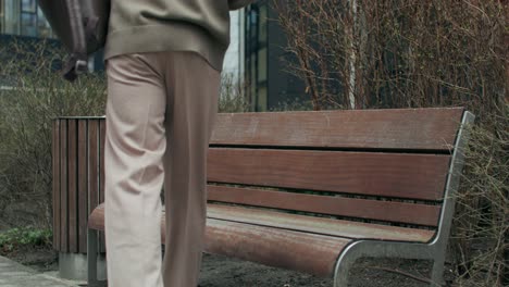 man sitting on a park bench