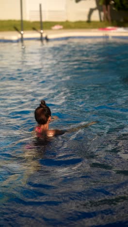 woman swimming in a pool