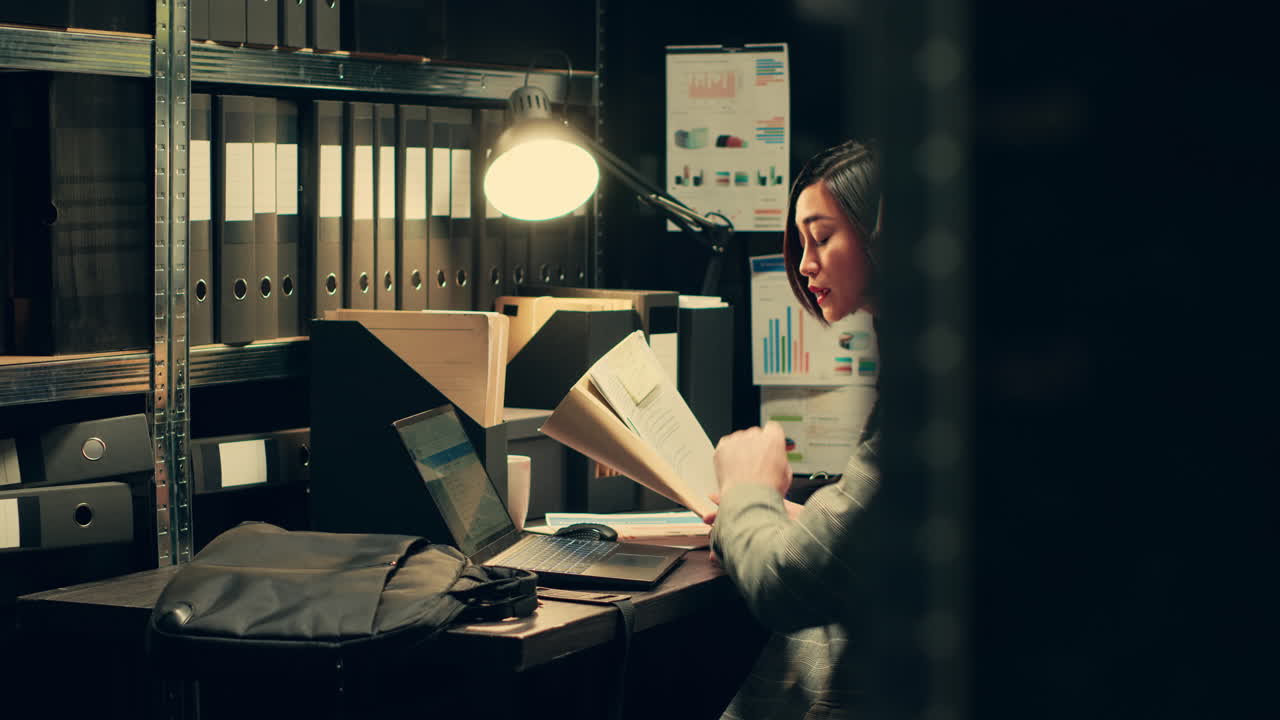 Team of private officers reading confidential folders with federal information