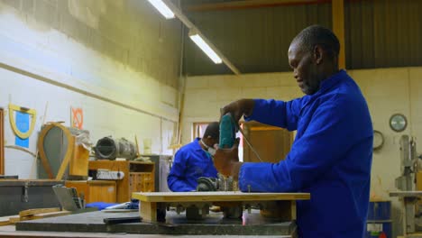 workers working on molds in foundry workshop 4k