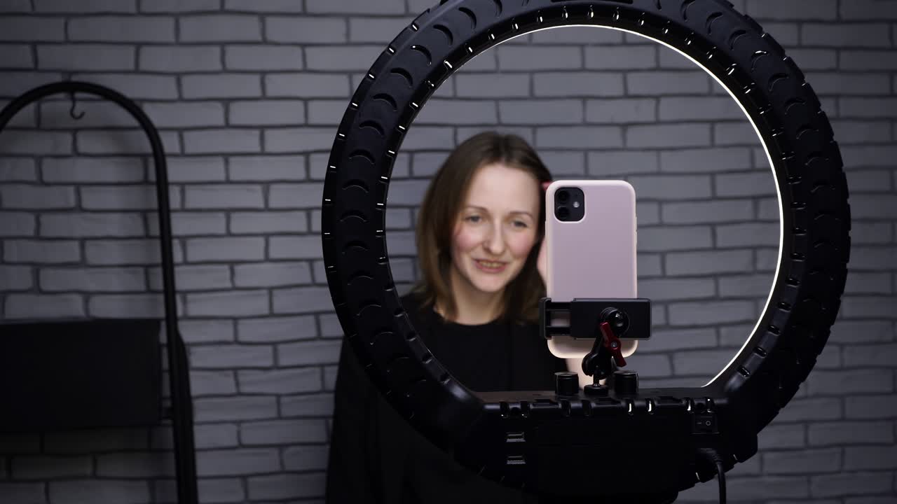 Footage of blogger girl talking with followers