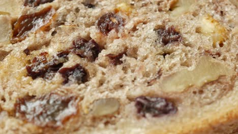 close-up of a slice of raisin bread