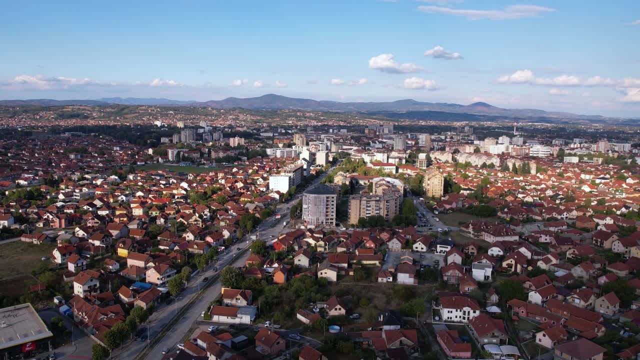 Aerial View of Cacak City, Serbia. Buildings and Street Traffic on Sunny Summer Day