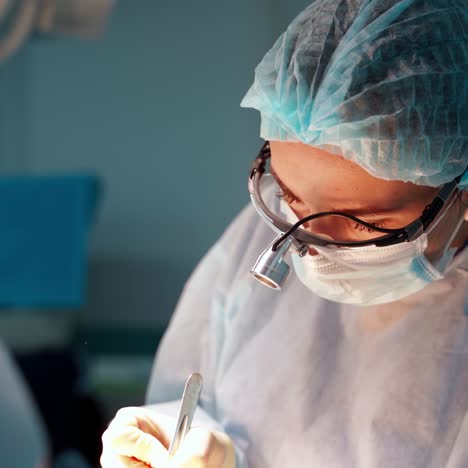 abdominoplasty plastic surgery. team surgeon at work in operating room. modern equipment in operating room.