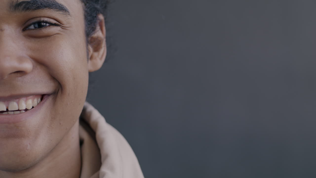 Close-up of a smiling young person