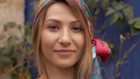 Closeup-portrait-of-bohemian-young-woman,-wearing-headscarf