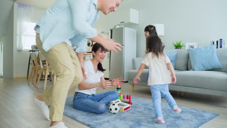 happy family playing together at home